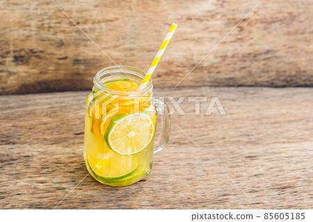 Homemade Fermented Raw Kombucha Tea Ready to Drink With orange and lime. Summer Homemade Fermented Raw Kombucha Tea Ready to Drink With orange and lime. Summer 85605185