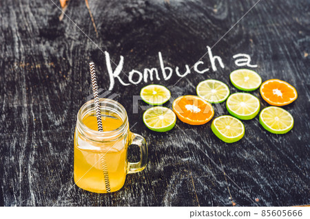Homemade Fermented Raw Kombucha Tea Ready to Drink With orange and lime. Summer 85605666