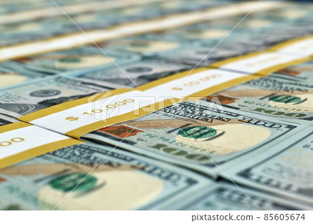 Bundles of USA one hundred dollar banknotes. 85605674