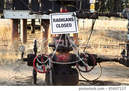 A Radigans Closed sign with equipment chained up A Radigans Closed sign with equipment chained up 85607137