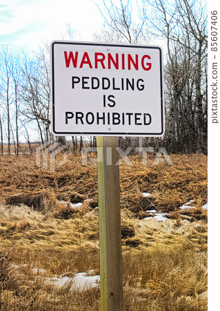 Warning peddling is prohibited sign Warning peddling is prohibited sign 85607406