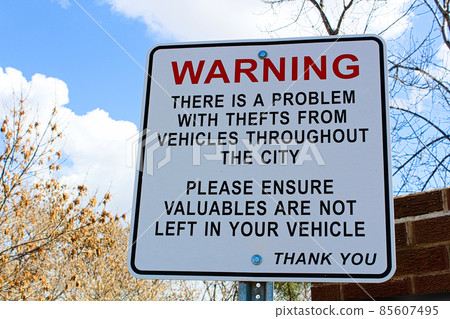 Warning sign about theft in the area 85607495