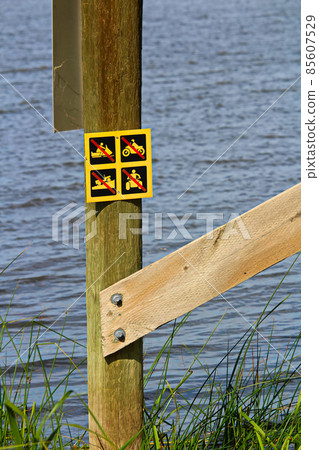 No off-road vehicle sign posted near water 85607529