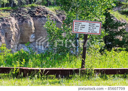 Danger keep away from edge stay on trail sign 85607709