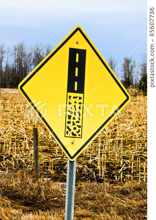 End of gravel road ahead warning sign End of gravel road ahead warning sign 85607786