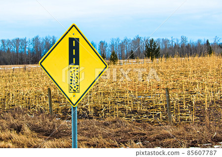 End of gravel road ahead warning sign End of gravel road ahead warning sign 85607787