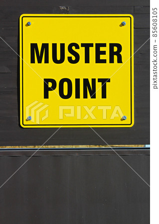 Muster assembly point sign on a wooden wall 85608105
