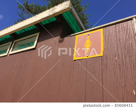 Female Sign Outside an Outdoor Public Toliet 85608431