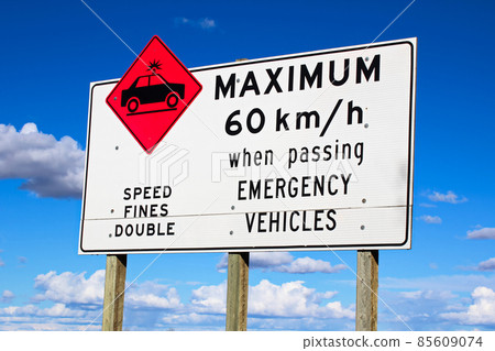 Maximum speed while passing emergency vehicles sign Maximum speed while passing emergency vehicles sign 85609074