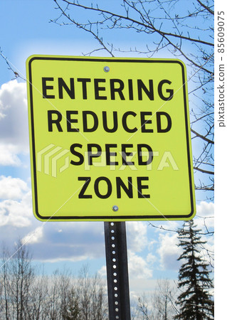Entering reduced speed zone sign Entering reduced speed zone sign 85609075