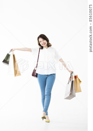 Shopping image young woman white background Shopping image young woman white background 85610075