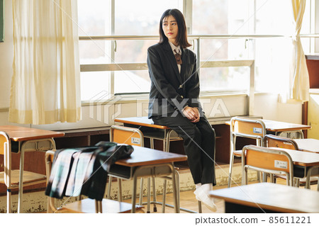 High school girl wearing slacks 85611221
