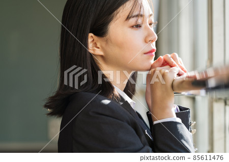 High school girl pensive in the classroom 85611476