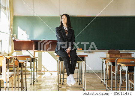 Portrait of a high school girl wearing slacks 85611482