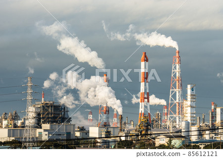 Chimneys of the complex that raises smoke 85612121