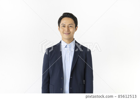 A man in his thirties looking at the camera portrait A man in his thirties looking at the camera portrait 85612513