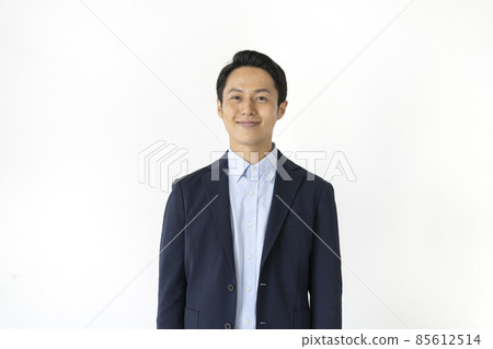 A smiling man in his thirties looking at the camera portrait A smiling man in his thirties looking at the camera portrait 85612514