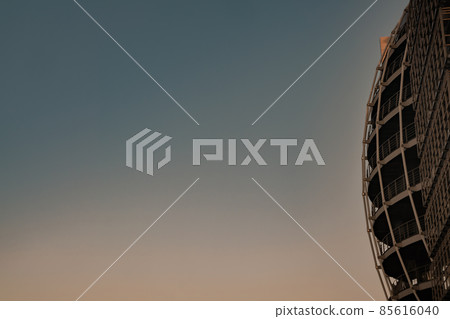 Side view of Modern building metal structure on a background of blue sky. 85616040