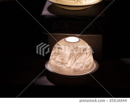 wax candle flame light on black dolphin decoration 85616844