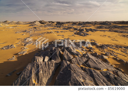 Rocky landscape at sunset in the White Desert, Egypt. Rocky landscape at sunset in the White Desert, Egypt. 85619000