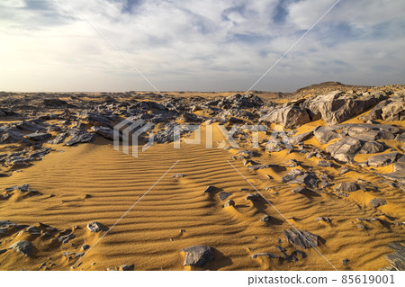 Rocky landscape at sunset in the White Desert, Egypt. Rocky landscape at sunset in the White Desert, Egypt. 85619001