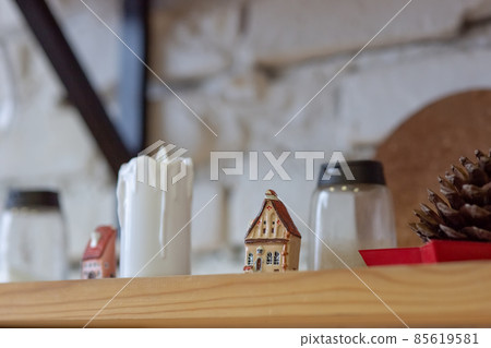 Wooden kitchen shelf with Christmas ceramic figurines Wooden kitchen shelf with Christmas ceramic figurines 85619581