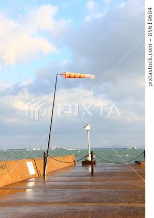 Breakwater windsock in strong winds 85619684