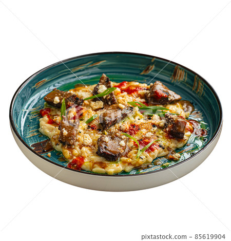 Gourmet dish veal cheeks with orzo pasta Gourmet dish veal cheeks with orzo pasta 85619904