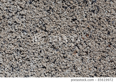 Crushed granite stones wall - close up 85619972