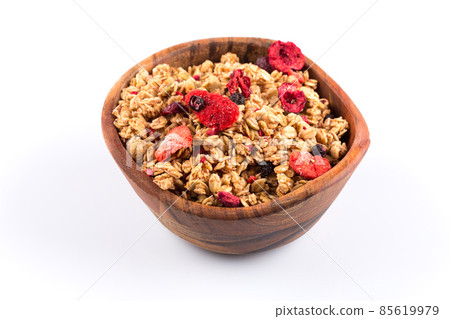 Muesli oat cereals close up background with dry fruits Muesli oat cereals close up background with dry fruits 85619979