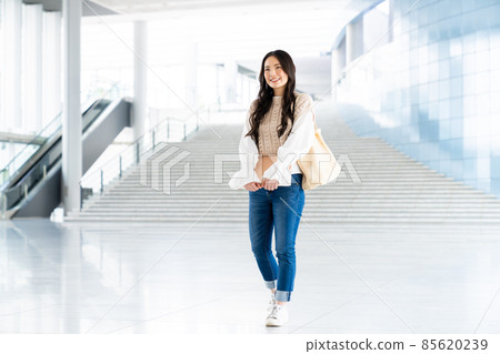 College student girl with a computer 85620239