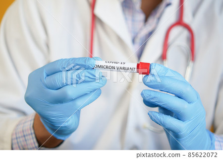 hand hold omicron variant corona virus blood test tube  85622072