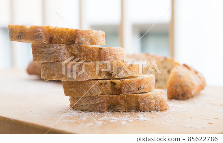 fresh loaf of bread on wooden board fresh loaf of bread on wooden board 85622786