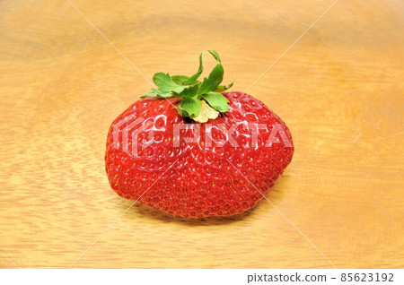 Strawberries with a distorted shape 85623192