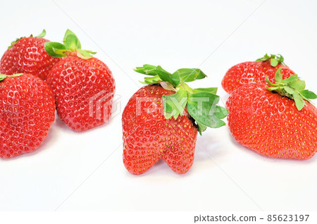 Strawberries with a distorted shape 85623197