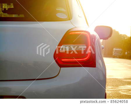 Rear combination lamp and sunset 85624058