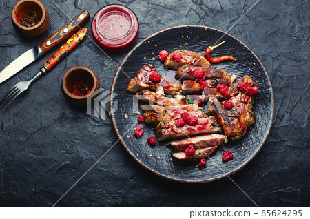 Fried steak with raspberry sauce Fried steak with raspberry sauce 85624295