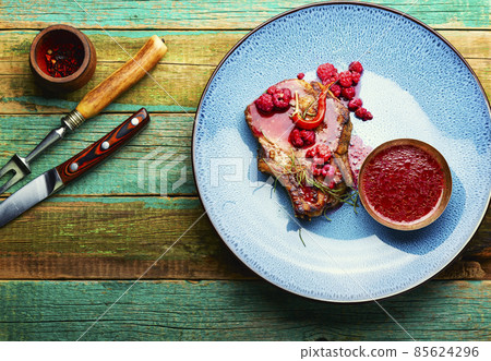 Pork steak with berry sauce, bbq Pork steak with berry sauce, bbq 85624296