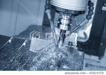 The CNC milling machine cutting the  mold parts with oil coolant method. 85624779