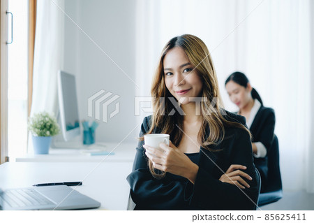 Business woman working to analyze technical price graph and indicator. account or saving money or insurance concept. Business woman working to analyze technical price graph and indicator. account or saving money or insurance concept. 85625411