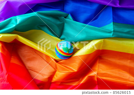 LGBTQ flag and symbol on table top view 85626015