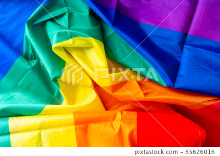 LGBTQ flag and symbol on table top view LGBTQ flag and symbol on table top view 85626016