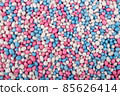 Pink, blue and white sugared Anise seeds 85626414