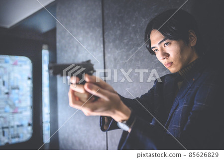 拿著槍的男人 85626829