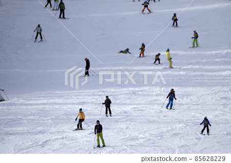 many skiers skiing in dolomites gardena valley snow mountains many skiers skiing in dolomites gardena valley snow mountains 85628229
