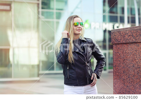 young blond slavic woman with long hair street portrait with glasses on shaping mall background young blond slavic woman with long hair street portrait with glasses on shaping mall background 85629100