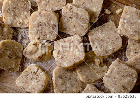 Homemade shortbread dough for sugar cookies with nuts Homemade shortbread dough for sugar cookies with nuts 85629635