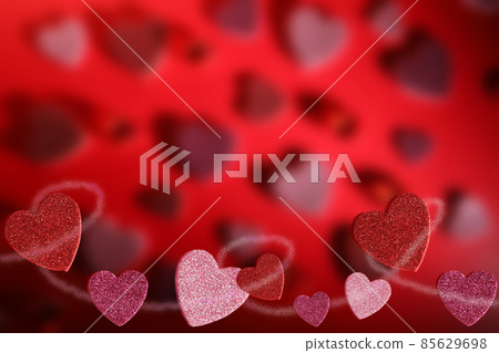 Glittery Pink and Red Hearts on a Defocused Red Heart Background Glittery Pink and Red Hearts on a Defocused Red Heart Background 85629698