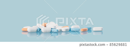 Background of white tablets or pills on blue table. Medicine and pharmacy Background of white tablets or pills on blue table. Medicine and pharmacy 85629881