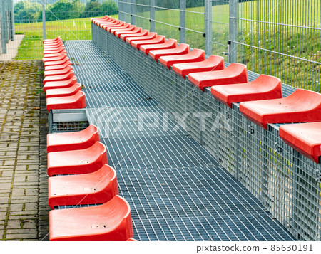Red tribune chairs. Plastic stadium seats Red tribune chairs. Plastic stadium seats 85630191
